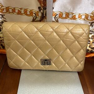 CHANEL Quilted Beige Clutch